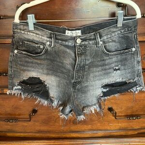 We the Free blackish gray cut off jean shorts distressed. Size 29. EUC
